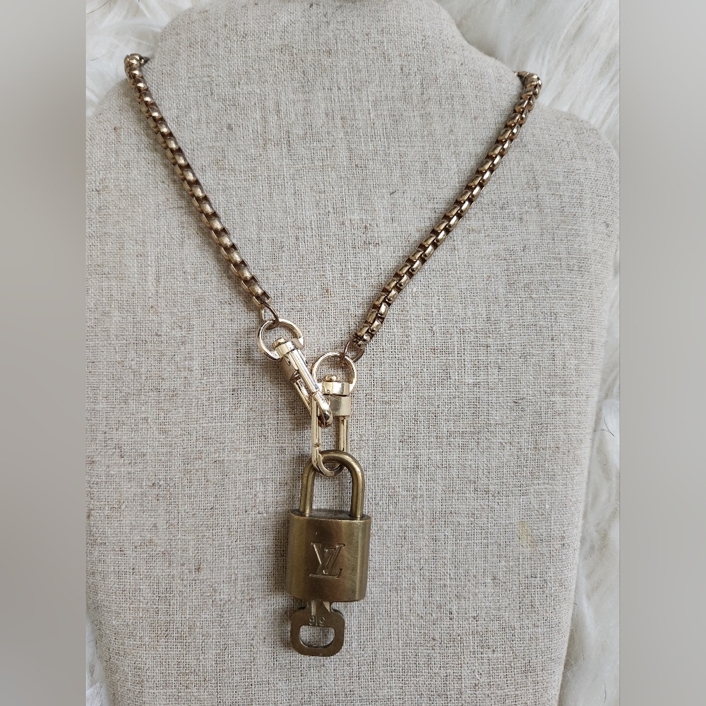 Louis Vuitton padlock and KeyNecklace  Authentic lockets (great condition)